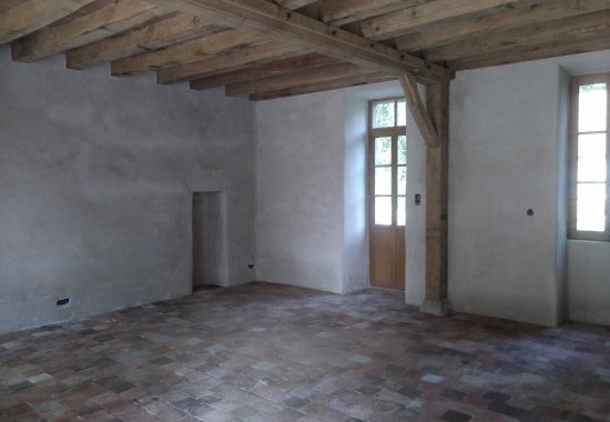 Pose d'enduit chaux-chanvre à l'intérieur dans le Cotentin